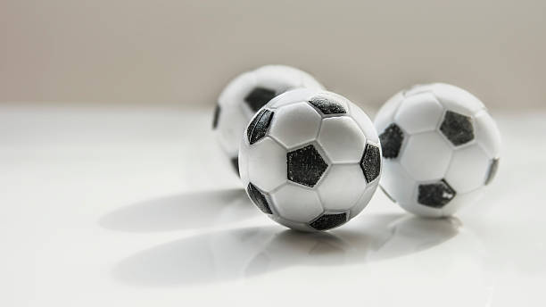 istock Football balls 537886248