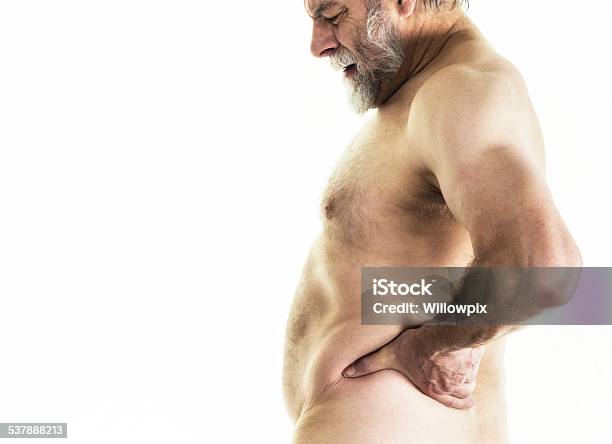 Overweight Senior Adult Man With Backache Pain Stock Photo - Download Image Now - Naked, Senior Adult, Senior Men