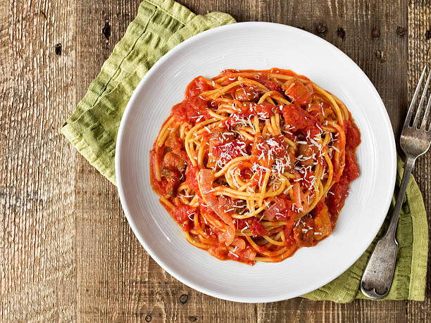 rustic italian bucatini amatriciana close up of rustic italian bucatini amatriciana all'amatriciana stock pictures, royalty-free photos & images