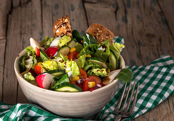 istock Close-up of fresh salad in bowl 537890312