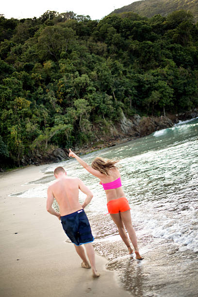 istock Couple Walking on the Beach 537890903