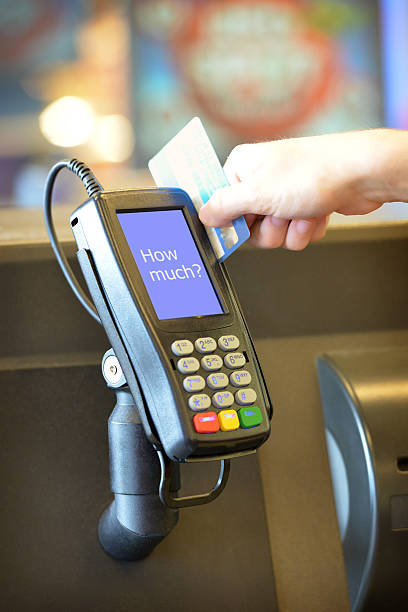 istock Credit card swiping through eftpos machine with words 537891271