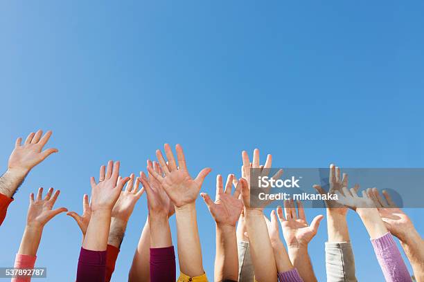 Hands Up In The Sky Stock Photo - Download Image Now - Hand Raised, Arms Raised, Group Of People