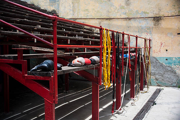 Boxing gloves on stands at boxing facility in Havana, Cuba stock photo