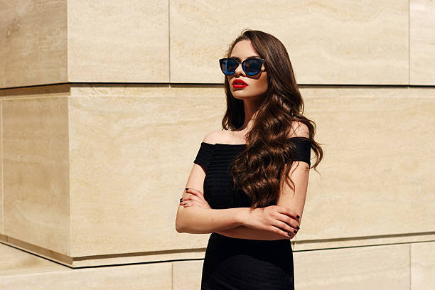 istock beautiful girl with long curly hair 537893340