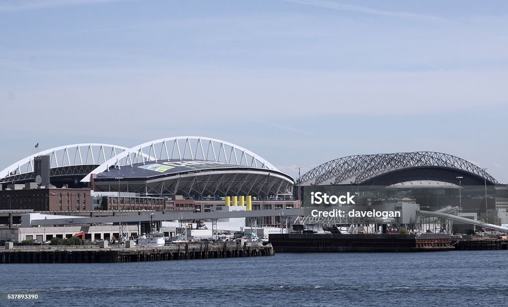 Seattle Seahawks And Mariners Stadiums Seattle Seahawks Century Link stadium (left) and the Seattle Mariners Safeco Field as seen from Elliott Bay Stadium Stock Photo