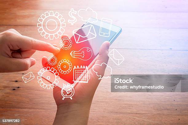 Smartphone With Finance And Market Icons Stock Photo - Download Image Now - Adult, Banking, Big Data