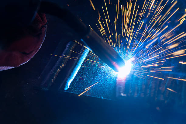 istock the welding spark light in close-up scene 537897436