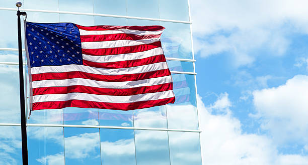 istock View of American flag on blue building background 537898320