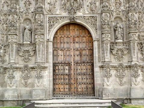 Tepotzotlán, Mexico - January 01, 2013: Detail of the San Francisco Javier Church door and facada. The church is part of the Museo Nacional del Virreinato and features one of the most important collections of Churrigueresque altarpieces in Mexico.