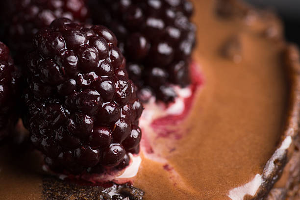 Stack of pancakes with fresh blackberries