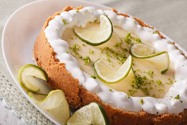 istock Gourmet lime tart with whipped cream and peel closeup. horizontal 537901752
