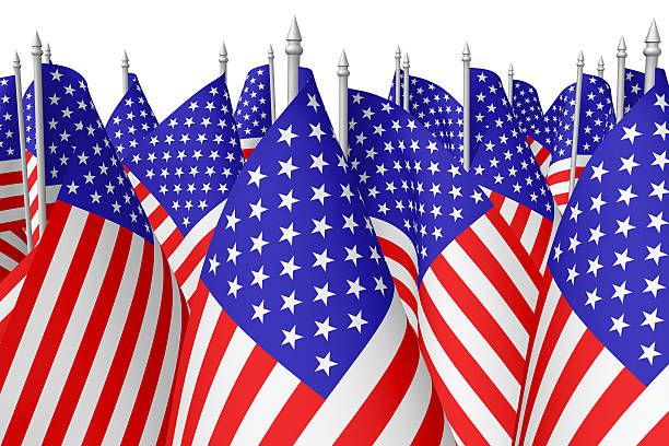 Many small american flags isolated on white closeup