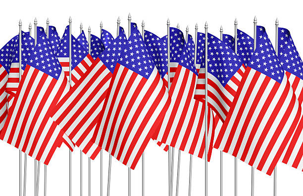 istock Many small american flags in row isolated on white 537905856