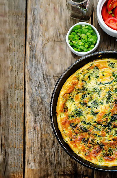 istock baked omelette with spinach, dill, parsley and green onions 537922877