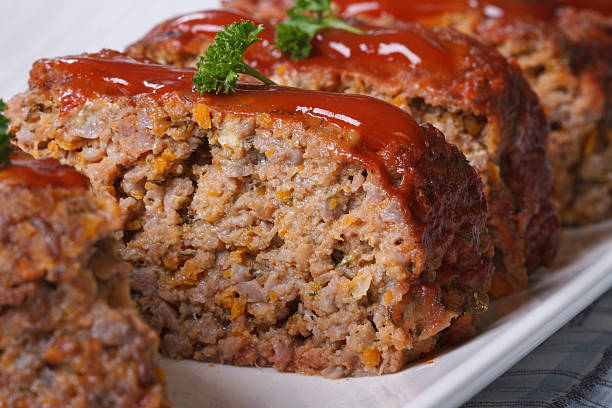 istock Delicious meat loaf with ketchup macro, horizontal 537924943