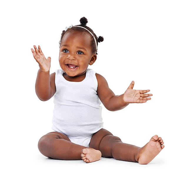 You deserve a big clap Studio shot of an adorable baby girl isolated on white babygro stock pictures, royalty-free photos & images