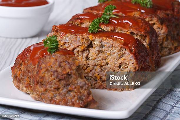 Sliced Meatloaf With Ketchup And Parsley Horizontal Stock Photo - Download Image Now