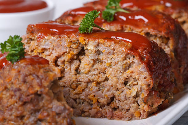 istock sliced meat loaf with tomato sauce  macro, horizontal 537950907