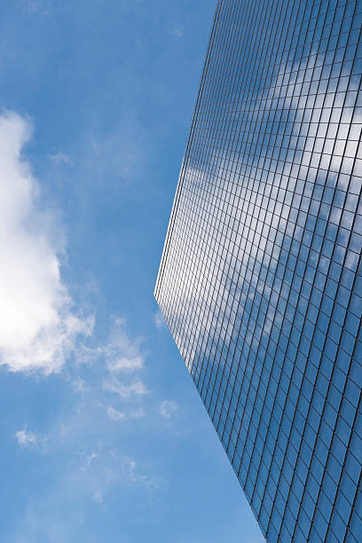istock Skyscrapers from ground view with blue sky visible 537951105