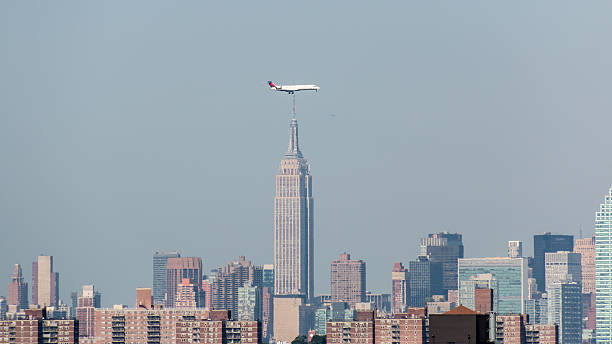 istock Planes flying above the skyscrapers 537951555