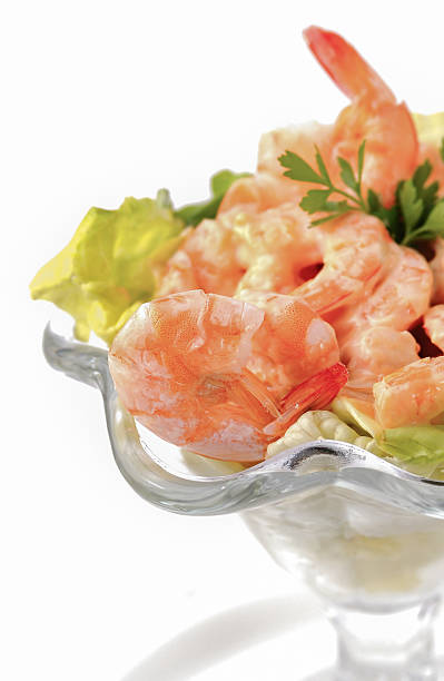 istock shrimp cocktail in pink sauce with salad 537952573