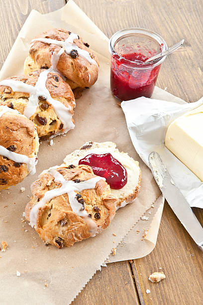 istock Hot cross buns with butter and jam 537953383