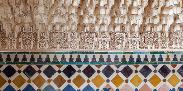 Polychromed lacework stucco in the Alhambra of Granada, Spain