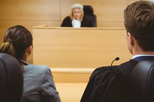 istock Judge talking with lawyers to make a decision 537971813