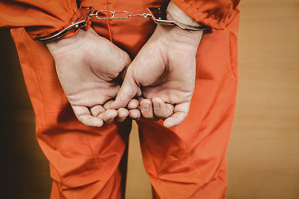 istock Hands of criminal with handcuffs 537971893