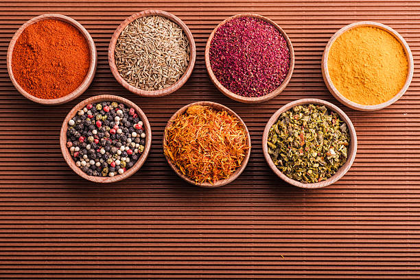 istock assorted spices in a wooden bowl 537972903