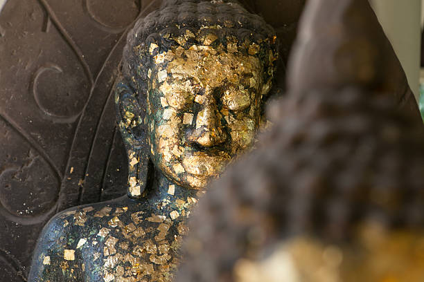 istock close up Buddha statue gilded in the measure 537975305