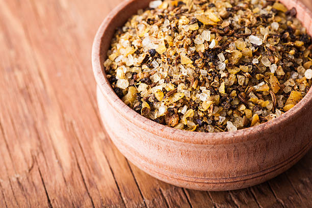 istock spice salt in a wooden bowl close-up 537976277