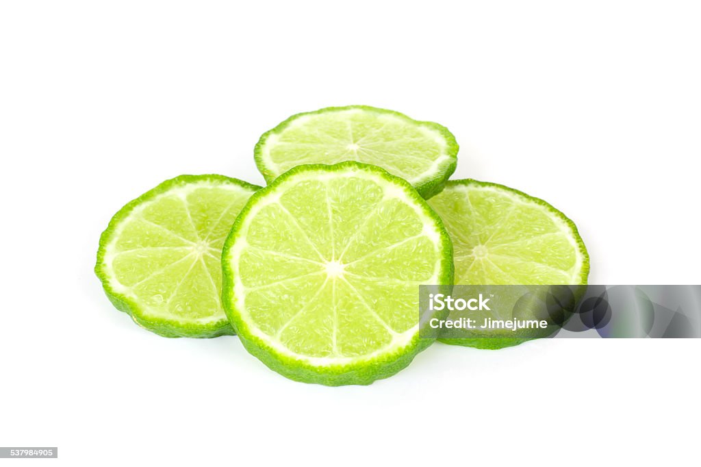 Bergamot (Kaffir lime) sliced Bergamot (Kaffir lime) sliced isolated on white background 2015 Stock Photo