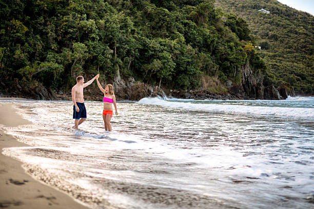 istock Couple Walking on the Beach 537986965