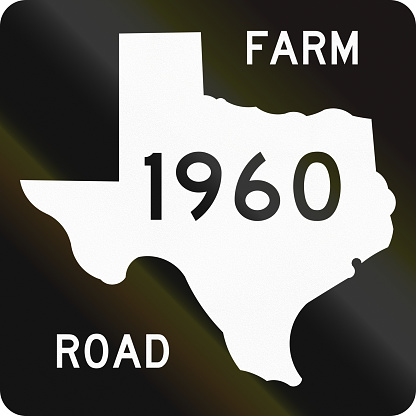 US farm-to-market-road shield in texas. The sign contains a silhouette of the state.