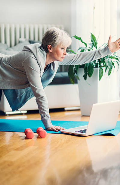 istock Mature Woman Exercising At Home. 538013041