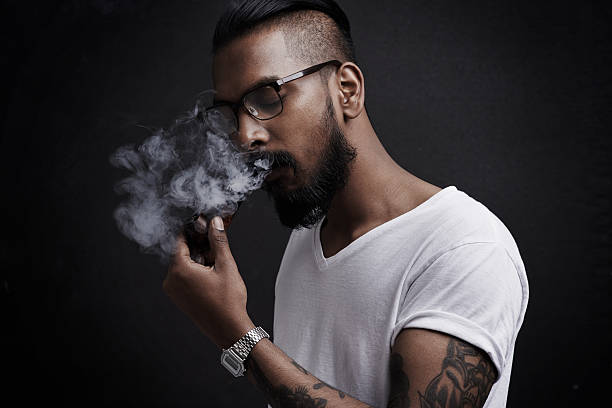 Lost In A World Of Smoke Stock Photo - Download Image Now - Tattoo, Smoking  Issues, Smoking - Activity - iStock