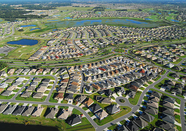 istock Aerial View of Sprawling Suburbs and Golf Course 538014999