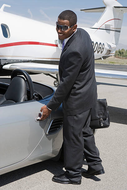 istock African-American businessman with airplane 538015531