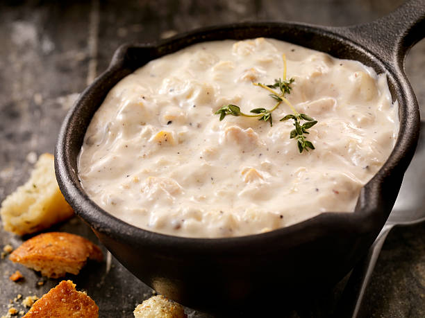 New England Style Clam Chowder New England Style Clam Chowder with Toasted Croutons and Fresh Thyme- Photographed on Hasselblad H3D2-39mb Camera cooked selective focus indoors studio shot stock pictures, royalty-free photos & images