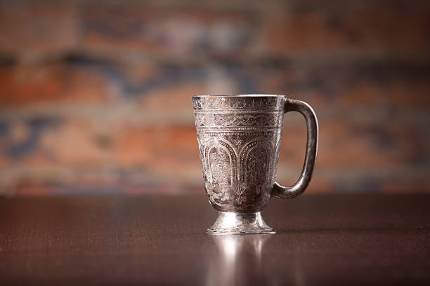 istock metal coffee cup with arabic decoration  on wooden desktop 538016107
