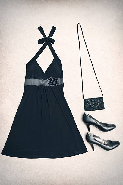 Little Black Dress Date Night Outfit A little black dress with black heels and a black purse.  Little Black Dress   crossdressing stock pictures, royalty-free photos & images