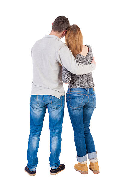 istock Back view of young embracing couple (man and woman) 538027102