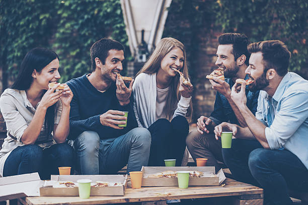 istock Enjoying pizza with friends. 538030528