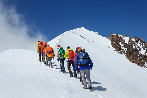 istock Group climbers goes down from the top of Erciyes volcano. 538033020