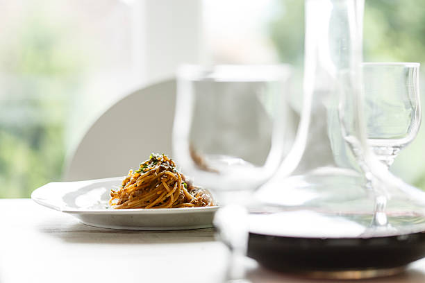Spaghetti served on a plate in a restaurant