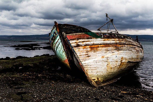 istock Old boats on scottish beach 538036357