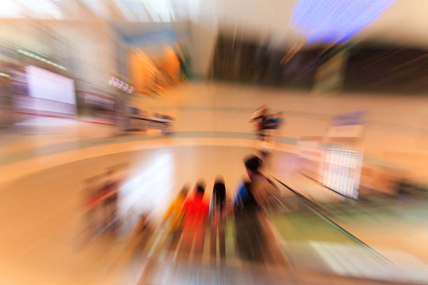 istock People in escalators at the modern shopping mall 538036777