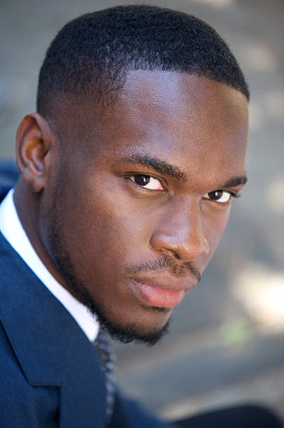 istock Young black businessman sitting outdoors 538037979
